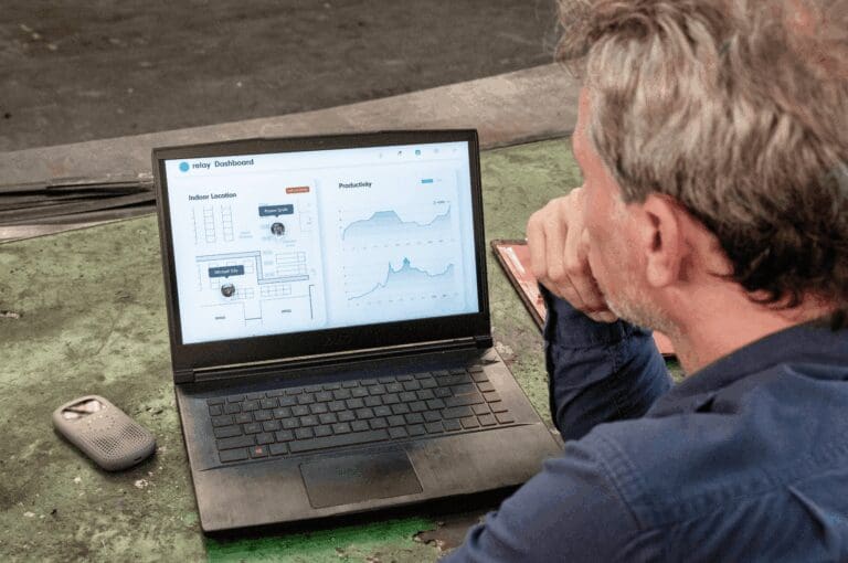 Male IT leader in industrial environment using RelayX and Relay platform as communications solution