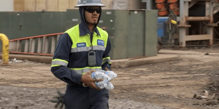A team member getting water for the rest of the team.
