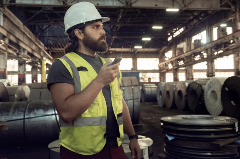 Industrial worker using Relay device to increase efficiency